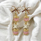 Desert Rose Rattlesnake Vertebrae Earrings | Rose Quartz